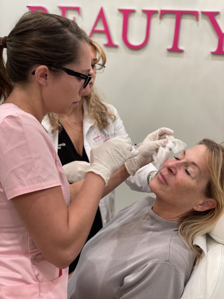 Aesthetic injector doing inject filler service